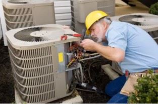 man working on an ac