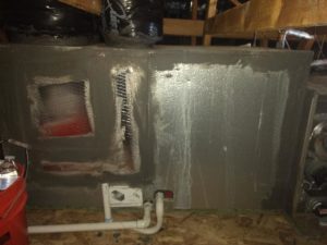 old ac unit in an attic